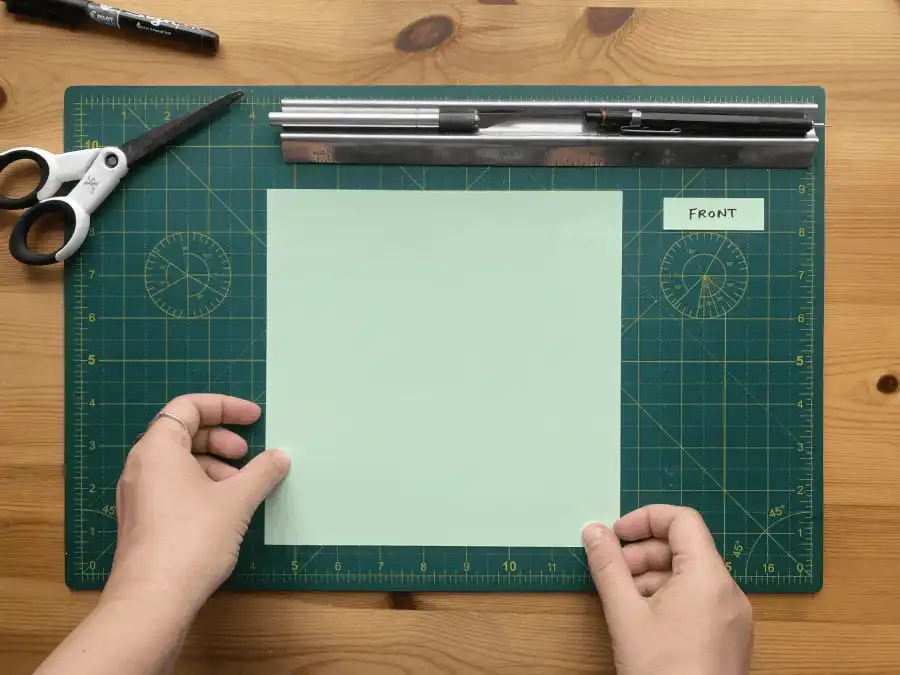 A gif showing stages of making a zine