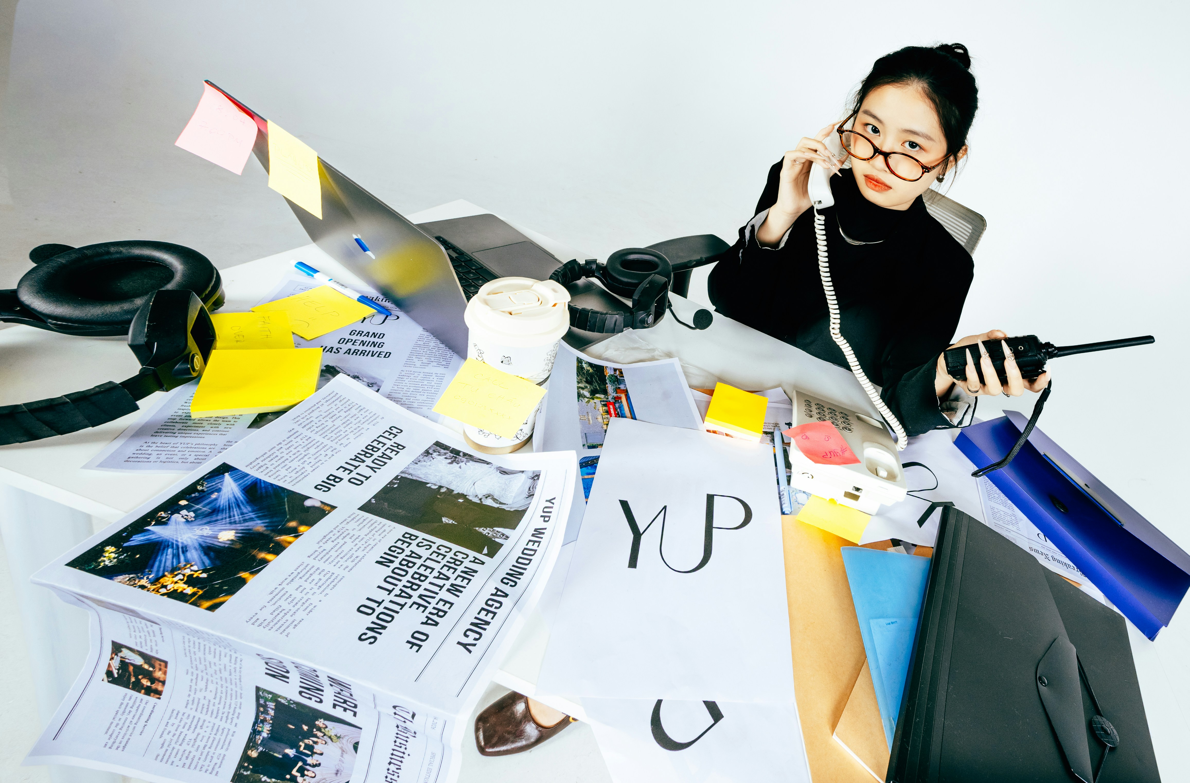 Busy woman at messy desk