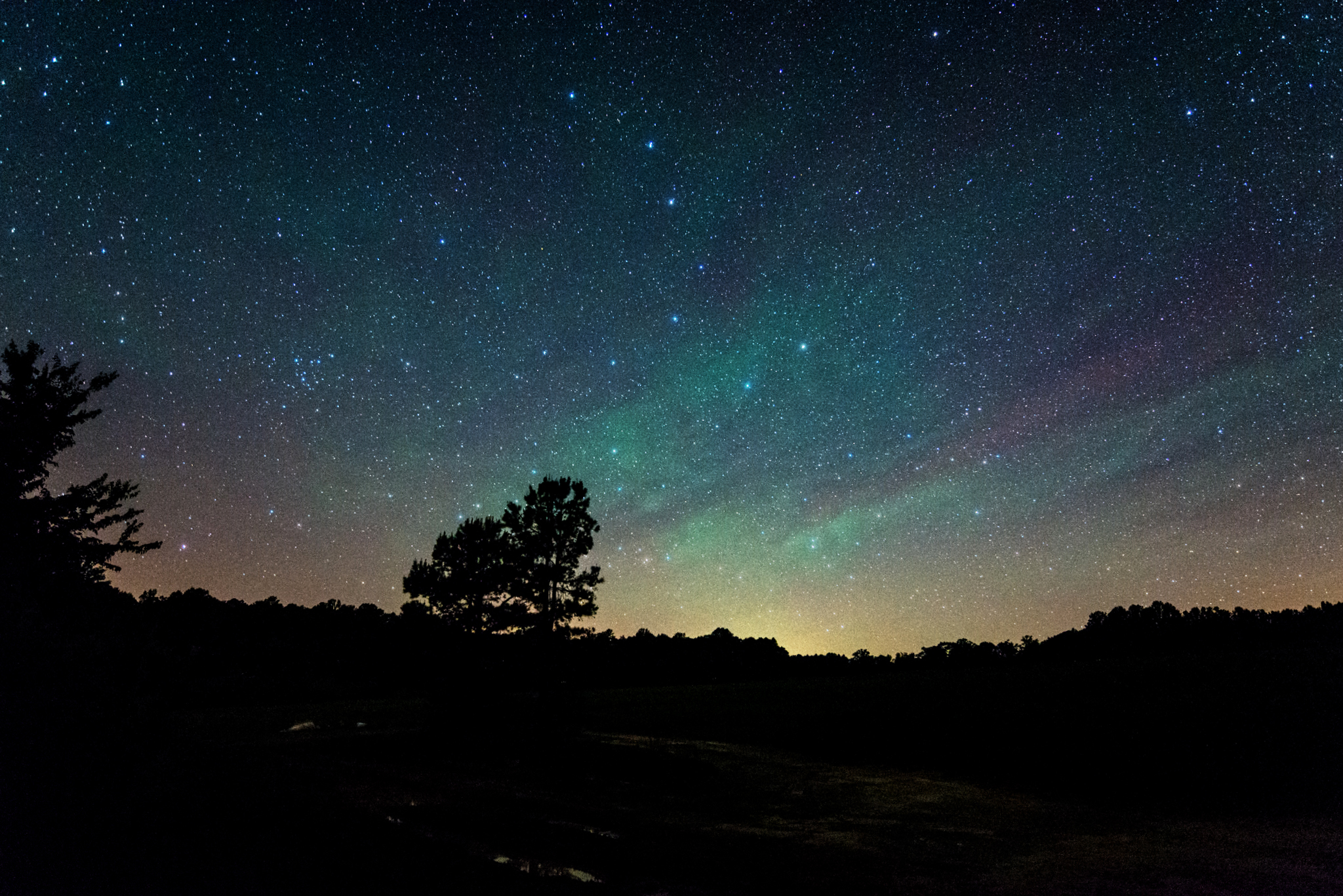 Colourful photo of The Big Dipper with aurora